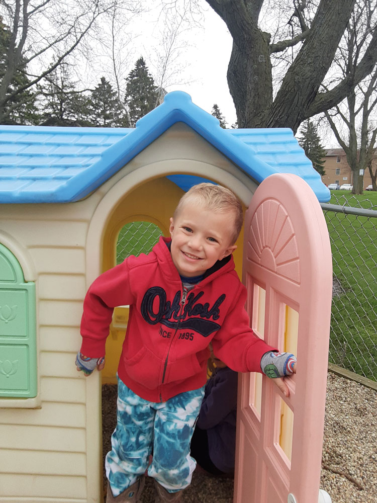 Boy In Play House
